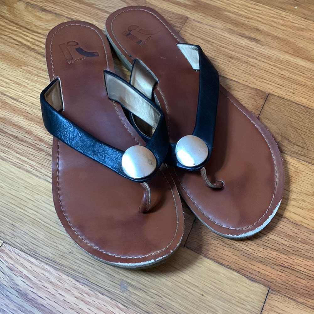 Black and gold Report flip flops
